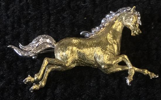 Gold and silver brooch modelled as a stallion